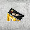 Shrimp Paste with Fish Roe displayed on slate with packaging at background in Singapore (flatlay).